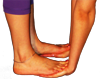 hands under foot closeup